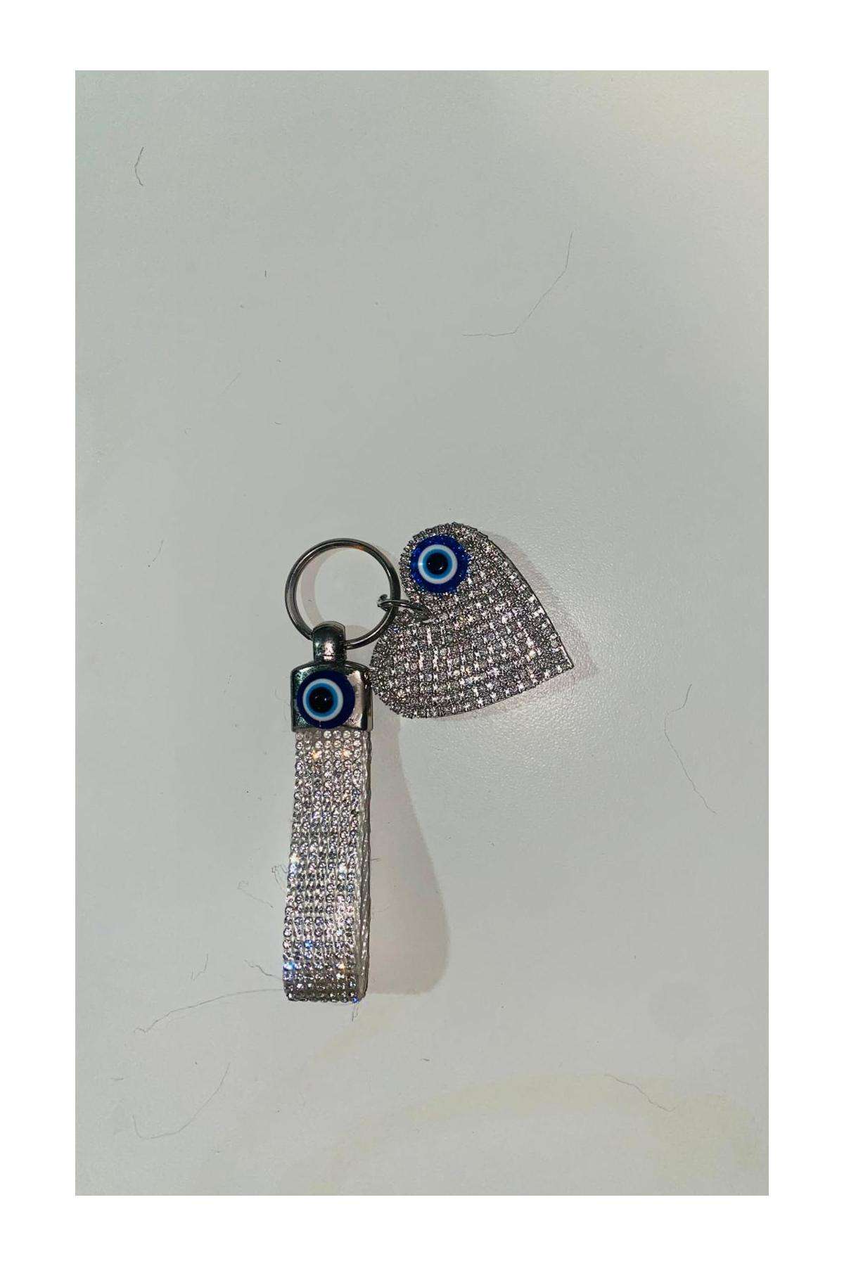 SWAROVSKİ TAŞLI KALPLİ NAZARLIKLI ŞERİT ANAHTARLIK